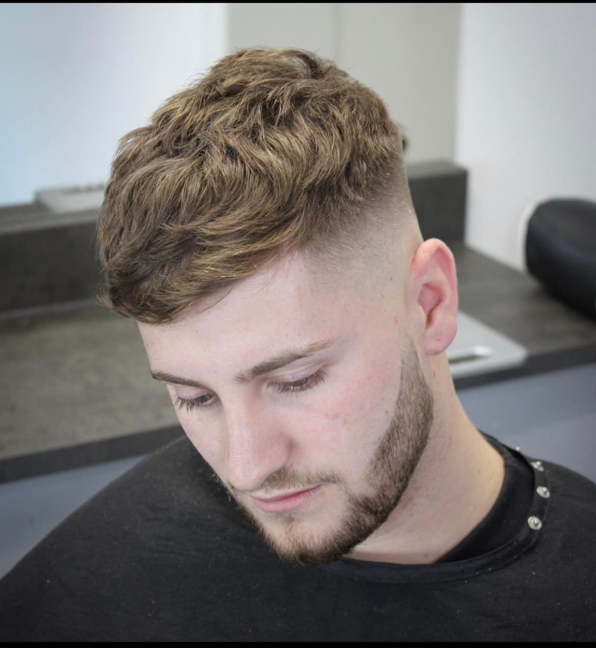 Clean skin fade with textured crop